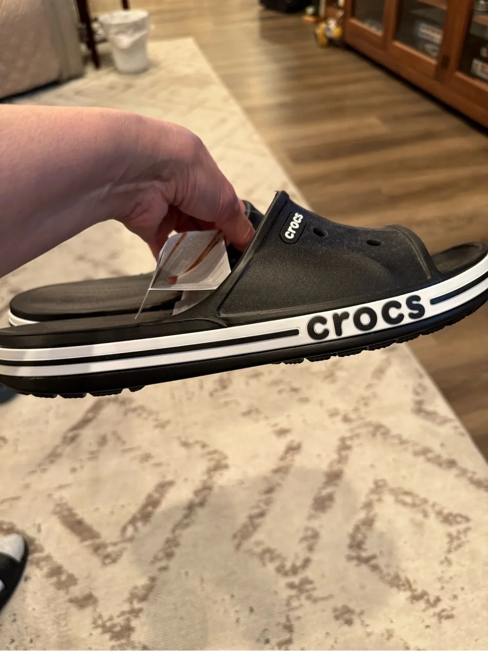 CROCS Black Slide Sandals with White Accent Stripe